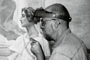 Tony Rajer wearing headgear while working on 1996 Cameron Murals restoration
