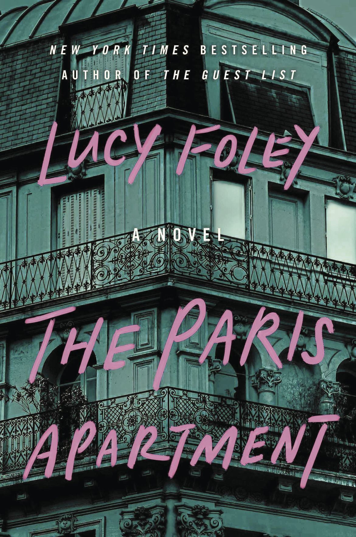 Book cover for Lucy Foley's The Paris Apartment; exterior shot of opulent exterior corner apartment.