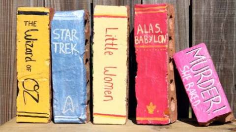 5 bricks painted to look like books
