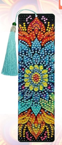 bookmark with mandala pattern of orange, blue and red crystals.