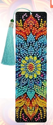 bookmark with mandala pattern of orange, blue and red crystals.